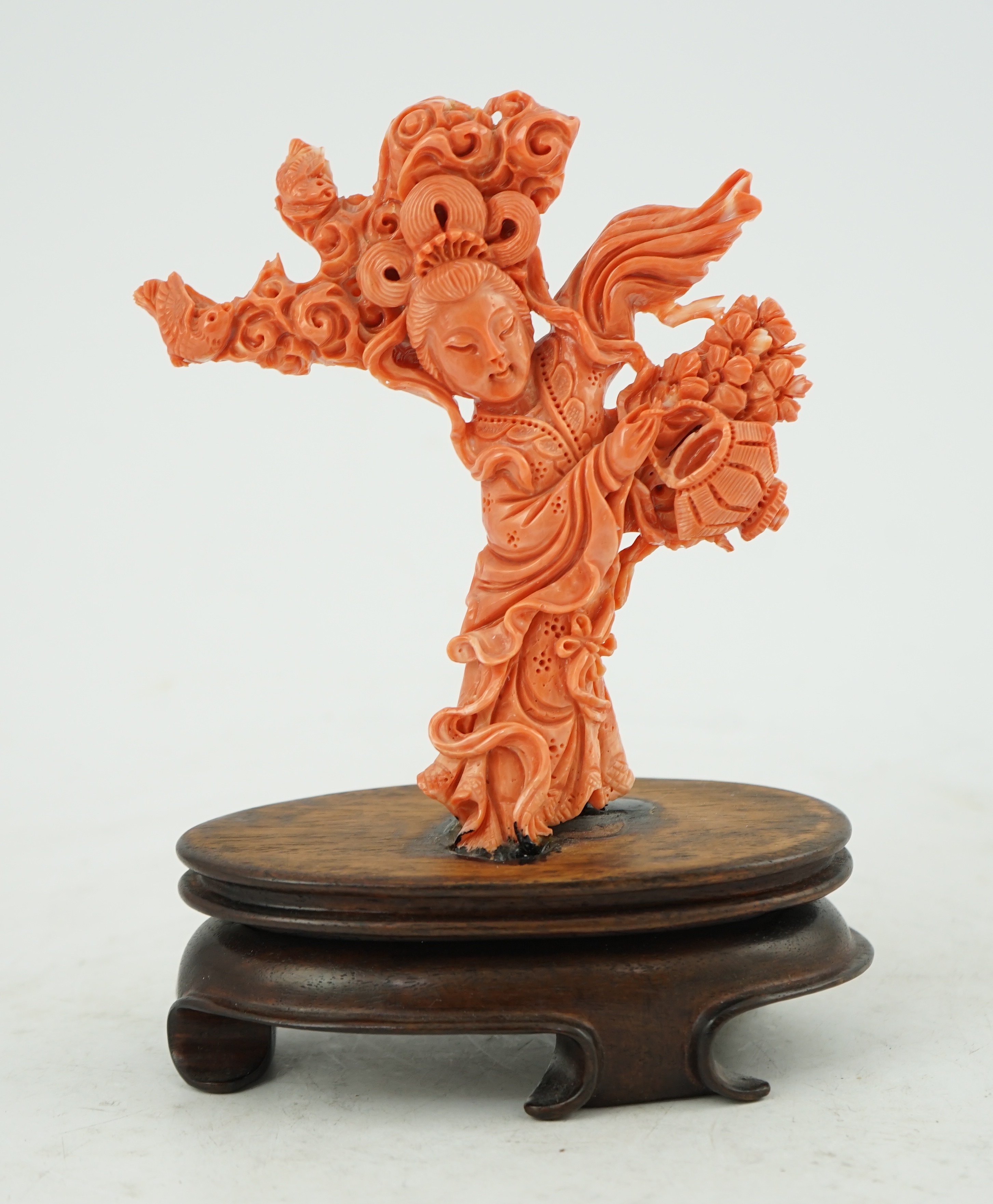 A large Chinese coral carving of a flower fairy, mid 20th century